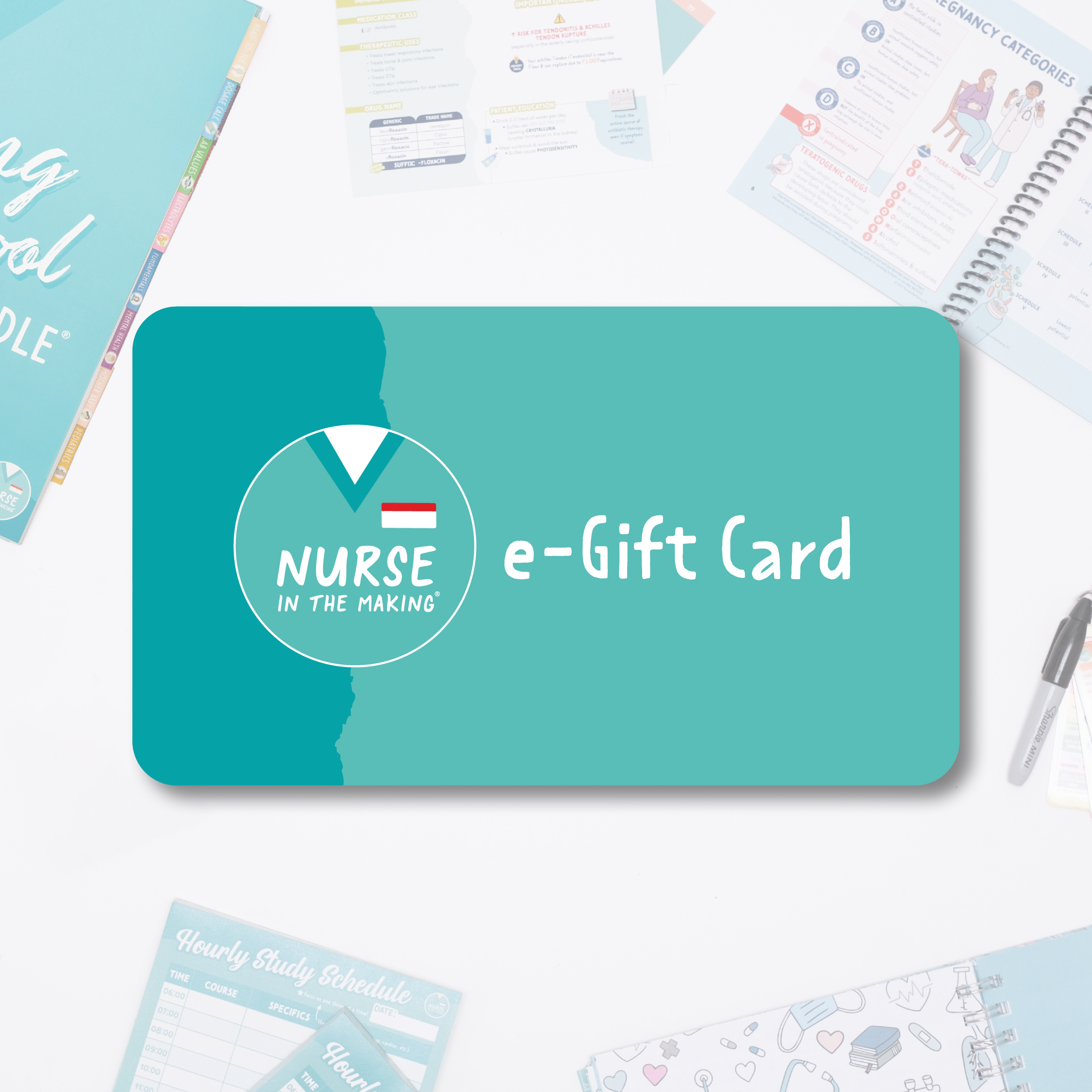 A teal-colored “Nurse in the Making” e-gift card with a stethoscope logo, placed on a white background. Surrounding the card are nursing study materials, including a planner, flashcards, and medical-themed stationery.