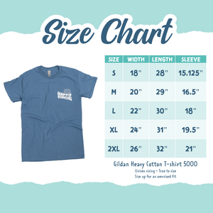 A size chart for the “Happy Studying” blue t-shirt, displaying measurements for sizes S to 2XL. The chart includes width, length, and sleeve dimensions in inches. A small image of the t-shirt is shown on the left, featuring the “Happy Studying” logo on the upper left chest. The text at the bottom notes that the shirt is a Gildan Heavy Cotton T-shirt 5000, true to size, with a recommendation to size up for an oversized fit.